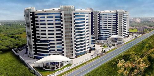 Dumas Apartment | 7 star Weekend studio at Rajhans Belliza by Global Hospitality