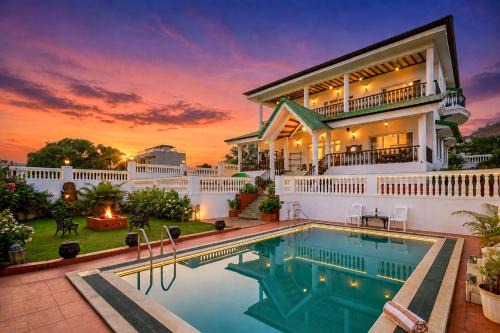 Lonavala Villa | Ananda Villa by StayVista - A serene escape with Mountain-view, Heritage interiors, Swimming pool & Lush lawn