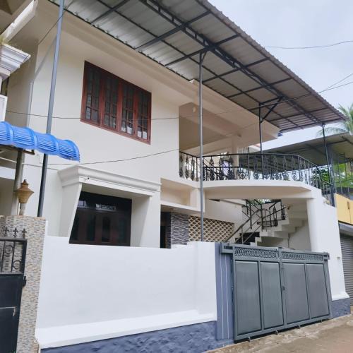 Kovalam House | Aromal Homestay