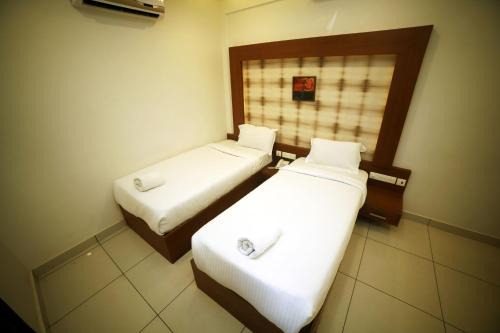 Payyanur Hotel | AURA RESIDENCY
