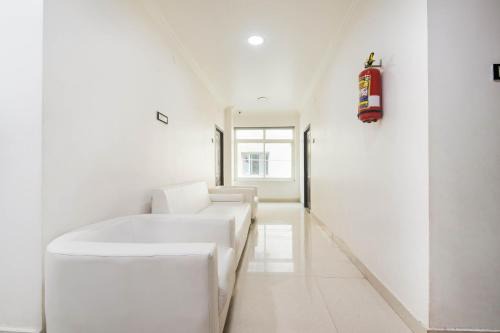 Guntur Hotel | Capital O Aditya Grand