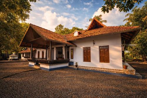 Mankombu House | Cotelac Heritage Lake Resort Alleppey by VOYE HOMES