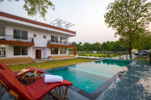 Faridabad Villa | ELIVAAS 3 BHK Amber Villa With Pvt Pool, Game Room & Studio Rooms