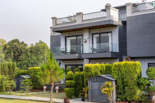 Bail Parao Villa | ELIVAAS Aranya Library Villas With Private Pool, Sit-out Area, Common Lounge & Garden With Forest Views