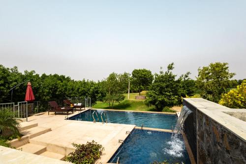 Jalor Villa | ELIVAAS Signature Stone Age Home Fernwood 6-BHK Stone-Clad Estate with Bamboo Cottages, Private Pool, Gazebo & Terrace Garden