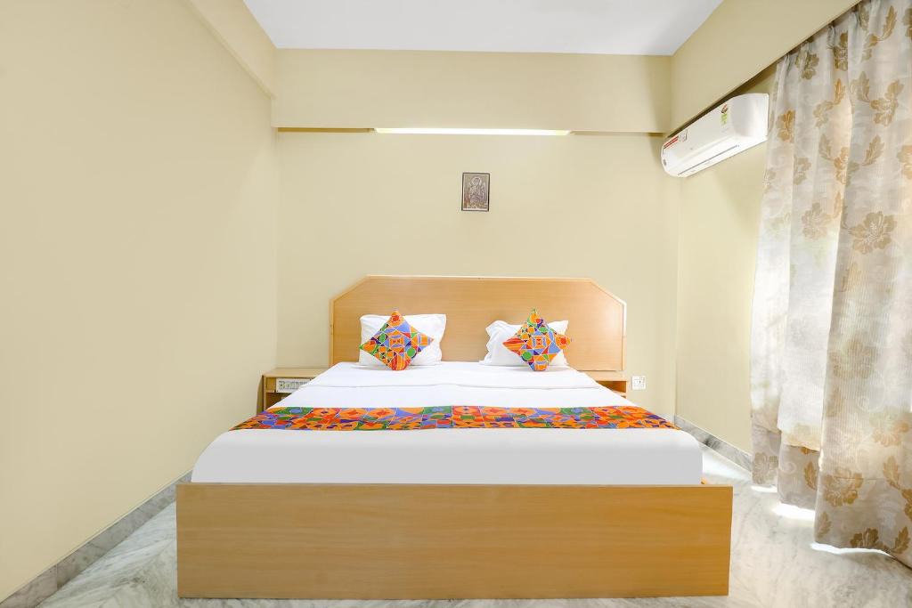Krishnarajapura Hotel | FabExpress Sri Sathya Sai
