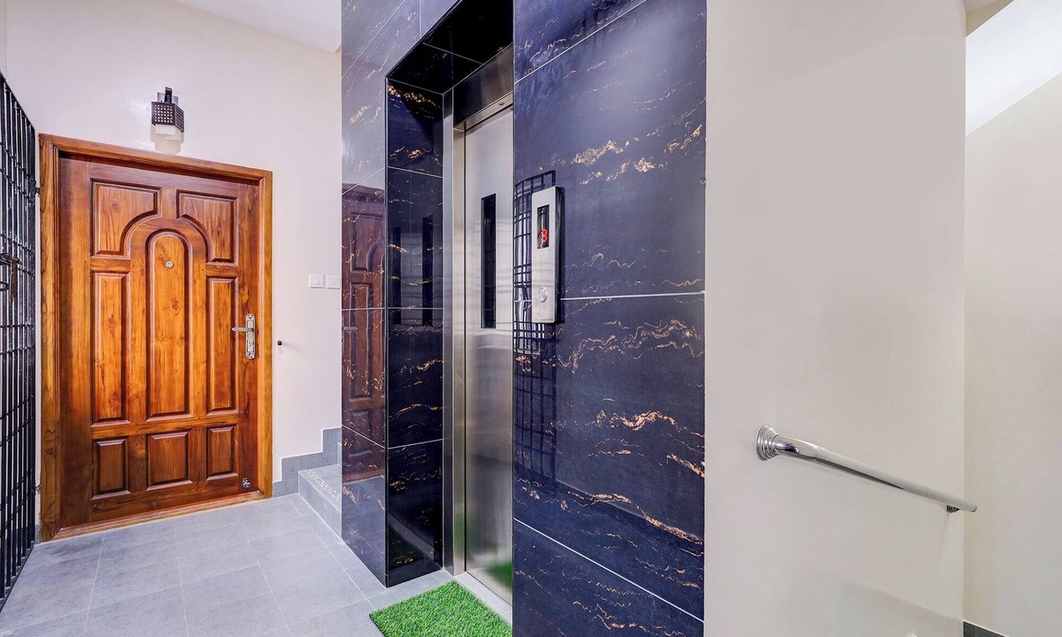 Central Chennai Hotel | FabHotel Home Tree Service Apartment I