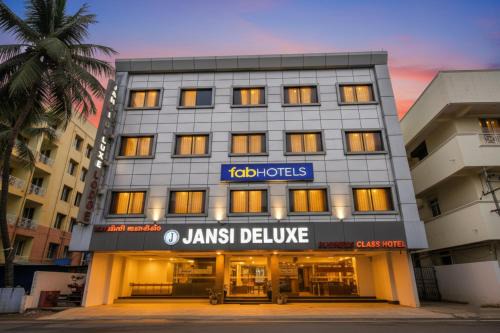 Gandhipuram Hotel | FabHotel Jansi Deluxe - Nr Gandhipuram Bus stand