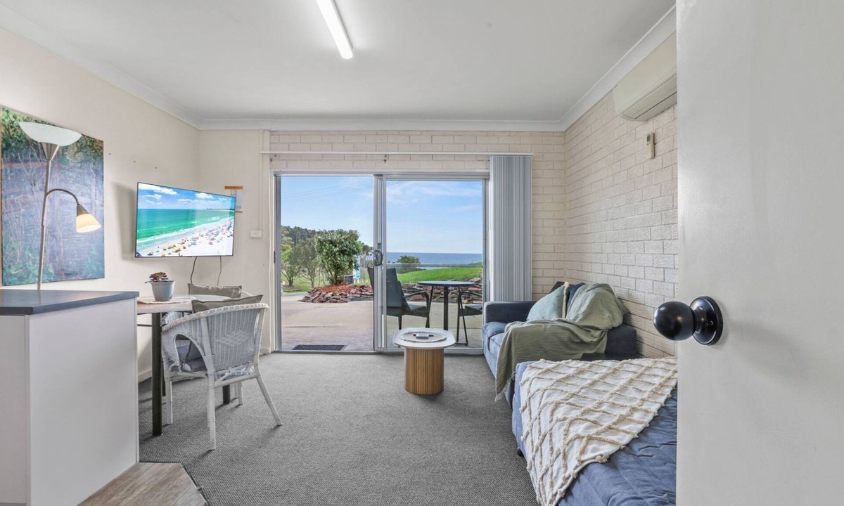 Narooma Apartment | Golfers View Unit 2 - enjoy spectacular views of the ocean and golf course.