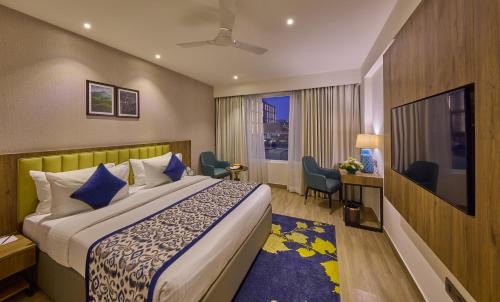 Vyalikaval HBCS Layout Hotel | Grand Continent Hebbal A Sarovar Portico Affiliate Hotel
