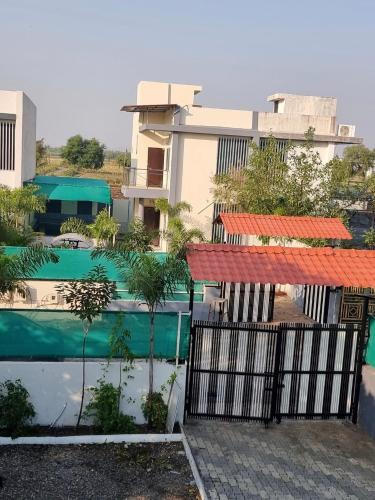 Olpad Villa | Green hevean farm house