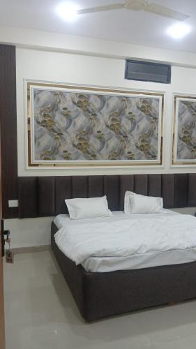 Rau Hotel | Gurukripa rooms rooftop party hall