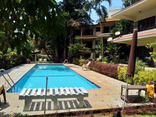 Arpora Apartment | Haven Amidst Nature in Villa Palmas, Arpora