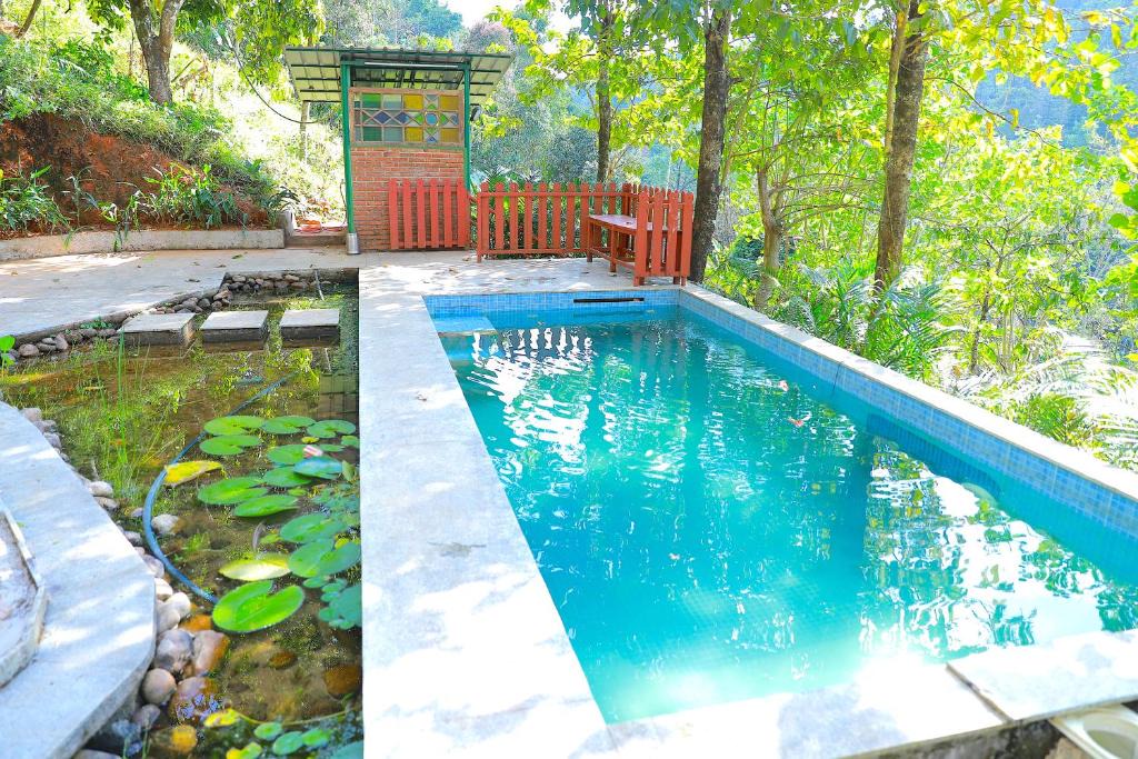 Kunchithanny House | Jade Munnar - Boutique Resort