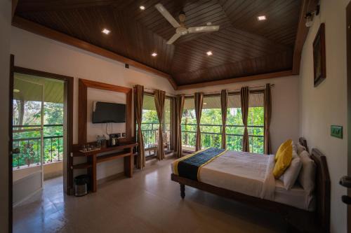 Madikeri Cabin | KINGMAKER'S Plantation with River Stream