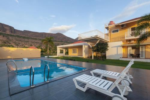 Khodala Villa | Lakeside Summers by VEO - Part of StayVista