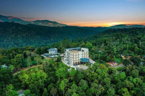 Rajakkad Hotel | Lemongrass inn munnar
