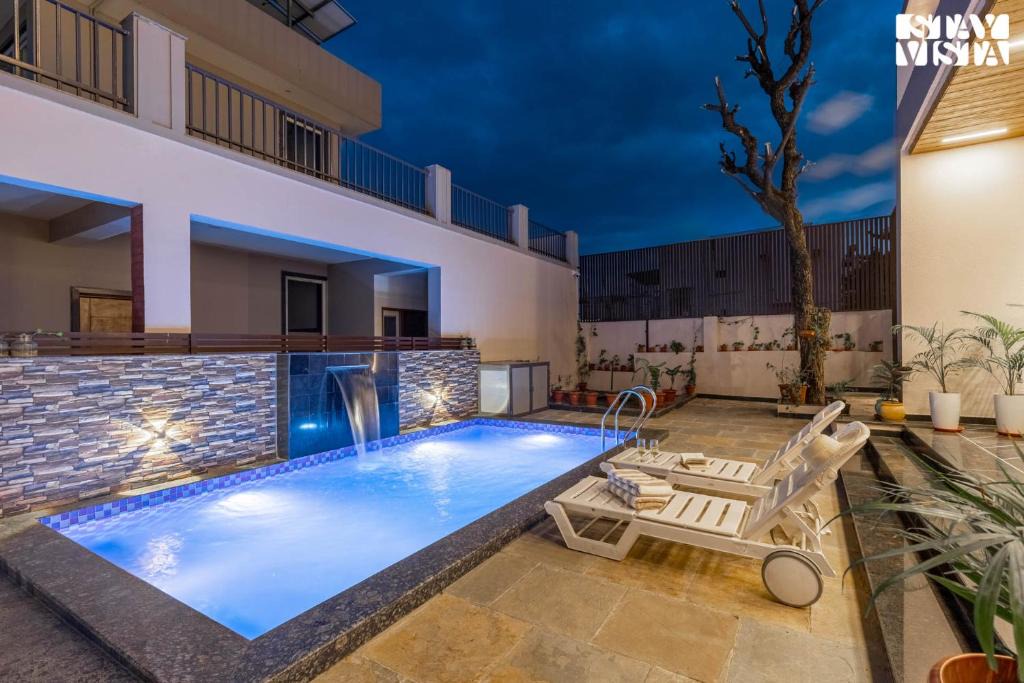 Fatehpura Villa | Nakeshatra Villa by VEO - Part of StayVista with Pool, Lawn, Balcony at city center in Udaipur