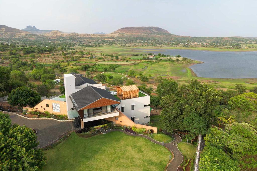 Igatpuri Villa | Pearl Lakeview Mansion by StayVista - Lakeside villa with Infinity pool, In-house theatre & Games room
