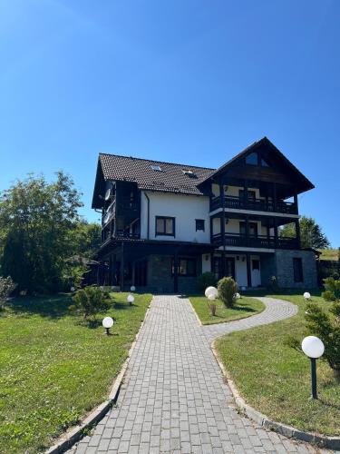 Colibita House | Pensiunea Bujor De Munte Colibita