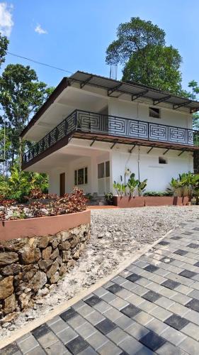 Todupulai Villa | River Woods Villas