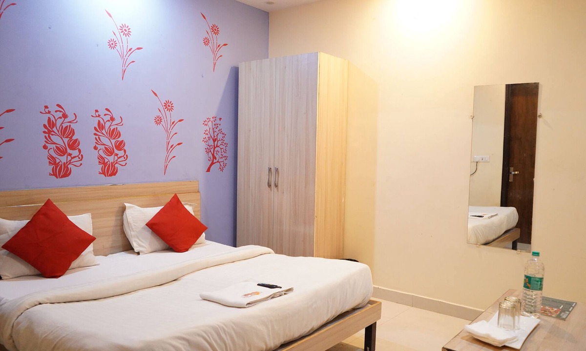 South West Hotel | Roomshala 002 Rose Residency