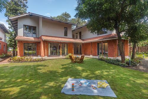 Murud-Harnai Villa | SaffronStays Amavi - 4BHK Villa in Dapoli with Lawn & Tropical Garden, Perfect for Family Celebrations