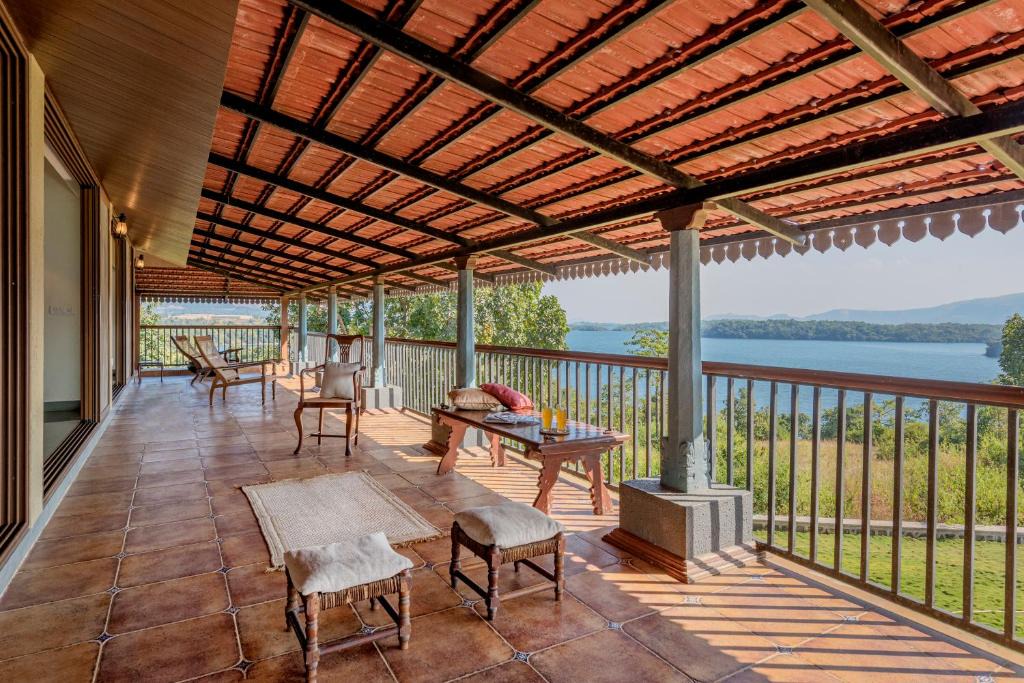 Wadgaon Villa | SaffronStays Anantham - 3BR Pet-Friendly Kerala-Style Lakefront Villa with Verandah & Views