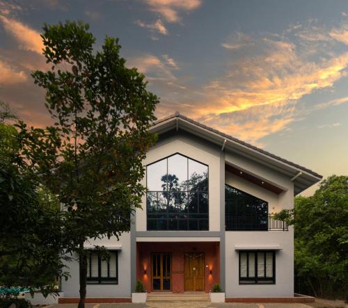 Alibaug Villa | SaffronStays Arabella - 4BR bohemian pool villa with sunken lounge, foosball, PS4 & mango orchard views in Alibaug