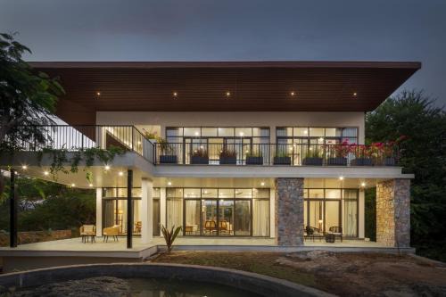 Bedla Villa | SaffronStays Camelot by the Lake - 3BR villa with glass walls, TT, projector, and gardens, Udaipur