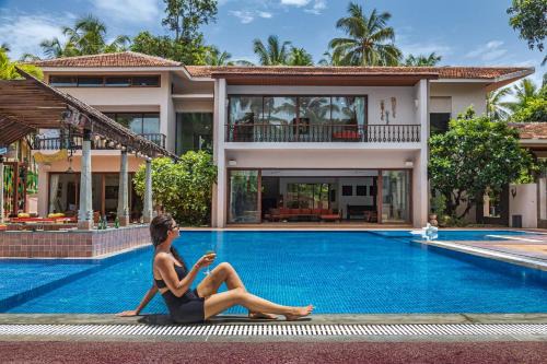 Alibaug Villa | SaffronStays Casa Del Palms - 8BR luxury pool villa with gazebo, pickleball, bar & lawns near Nagaon Beach