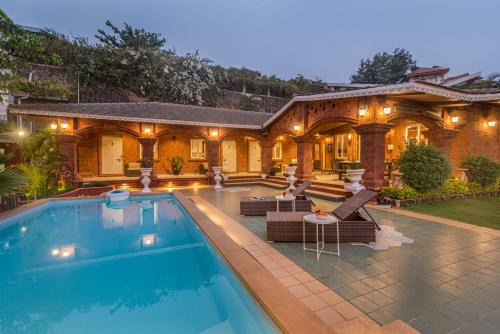 Kune Village Villa | SaffronStays Chira-5BR heritage villa with laterite stone walls, verandah sit-outs & private pool