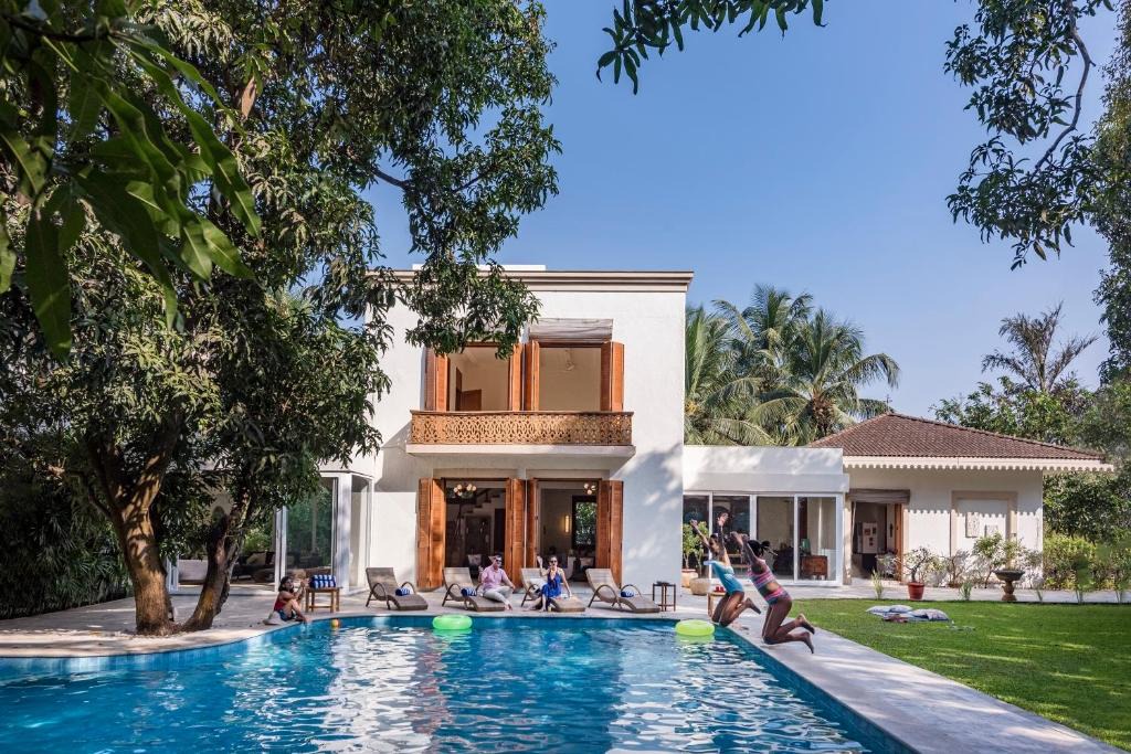 Alibaug Villa | SaffronStays Hacienda by the Sea - 5BR Spanish-style pet & elder-friendly pool villa with lawns, beach access & BBQ nights
