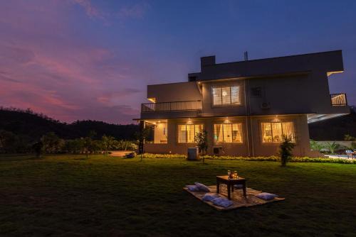 Kolad Villa | SaffronStays Midori - 4BR riverside villa with pool, lawn, terrace & access to Kundalika River rafting site