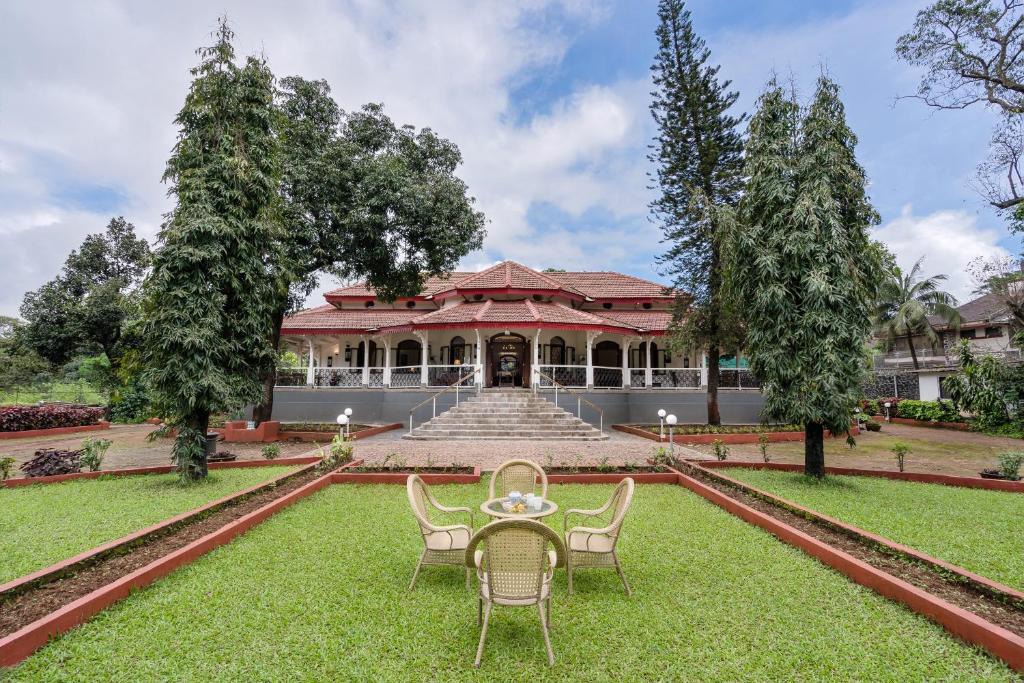 Tungarli Villa | SaffronStays Mosaic - 4BR 100-year-old heritage villa with lawns, porch sit-outs & play area near Lonavala