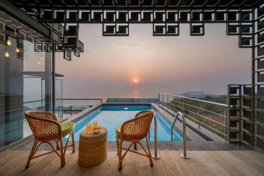 Harnai Villa | SaffronStays Nautica - 5BR hilltop villa with rooftop pool, sea views & modern interiors surrounded by greenery