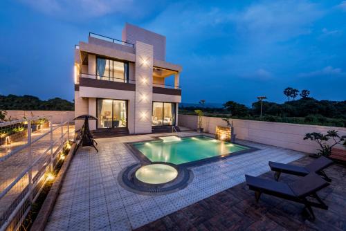 Alibaug Villa | SaffronStays Nishta - 4BR pet-friendly villa with pool, turf, gazebo & terrace BBQ views in Alibaug