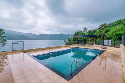 Paud Villa | SaffronStays Riverdale - 4BR pool villa in Lavasa with gazebo, Indonesian artwork, and cricket pitch