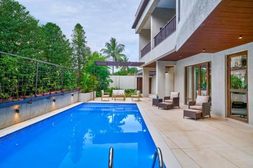 Alibaug Villa | SaffronStays Sea Breeze - Pet Friendly Luxury 4BR Pool Villa, Game Room & Terrace near Saral Beach, Alibaug