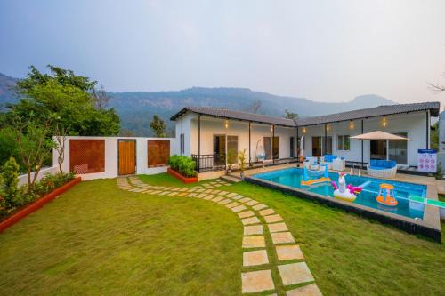 Kalote Mokashi Villa | SaffronStays Turquoise Maison - 3BR pool villa with jacuzzi, bonfire & fruit garden near Lake Kalote, Karjat