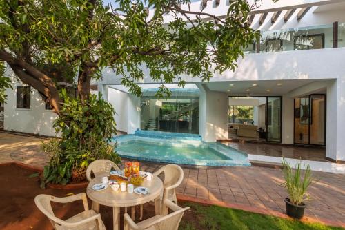 Tungarli Villa | SaffronStays Vedanta - 5BR luxury villa with plunge pool, game zone, lawn & Tungarli Lake nearby
