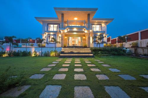 Igatpuri Villa | SaffronStays Zeel by the Lake - 4BR lakefront pool villa with gazebo, games room & stunning Bhavali Dam views