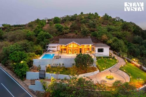 Kadadhe Villa | StayVista at Apukaa - Amarja Hills with Karaoke, Pool