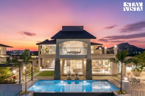 Kurvande Villa | StayVista at Meadows Land with Bonfire