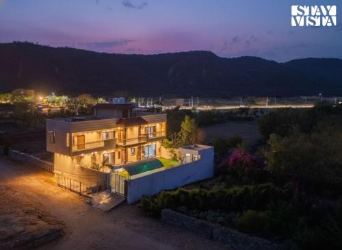 Jaipur Villa | StayVista at The Binclave with Jacuzzi, Pvt Indoor Pool, Bar & Projector