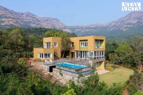 Paud Villa | StayVista at The Chirping Villa with Infinity Pool