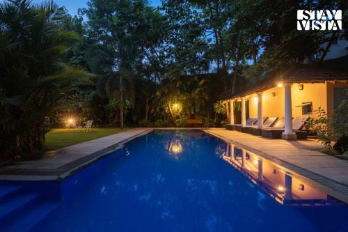 Grand Morrod Villa | StayVista at Villa Nimaya with Lawn & Pool