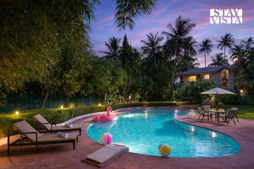 Akshi Villa | StayVista at Waves by the Beach with Beach Access, Pool, Lawn