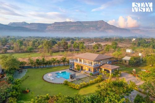 Vaijanath Villa | StayVista's Hillside Meadows - Mountainside Retreat with Farm View, Pool & Deck, Lawn & Gazebo