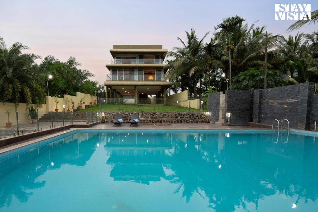 Wadgaon Villa | StayVista's Rivulet Waters - Lakefront Villa with Infinity Pool, Jacuzzi, Lawn, and Rustic Gazebo